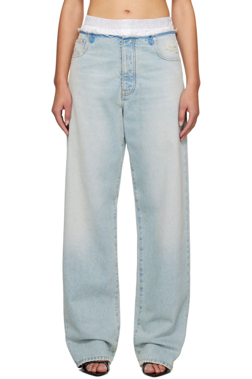Loose-fit straight-leg non-stretch denim jeans. Fading, whiskering, and distressing throughout.

· Studs at elasticized waistband
· Five-pocket styling
· Button-fly
· Logo patch at back waistband
· Partial poplin lining
· Contrast stitching in orange

Supplier color: Blueish white