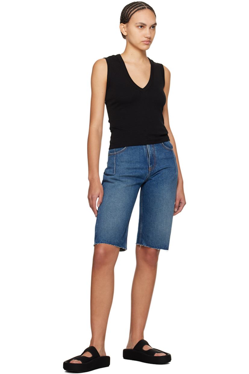 Non-stretch denim shorts. Darts, fading, and subtle distressing throughout.

· Belt loops
· Five-pocket styling
· Zip-fly
· Raw edge at cuffs
· Logo patch at back waistband
· Contrast stitching in tan

Supplier color: Medium wash