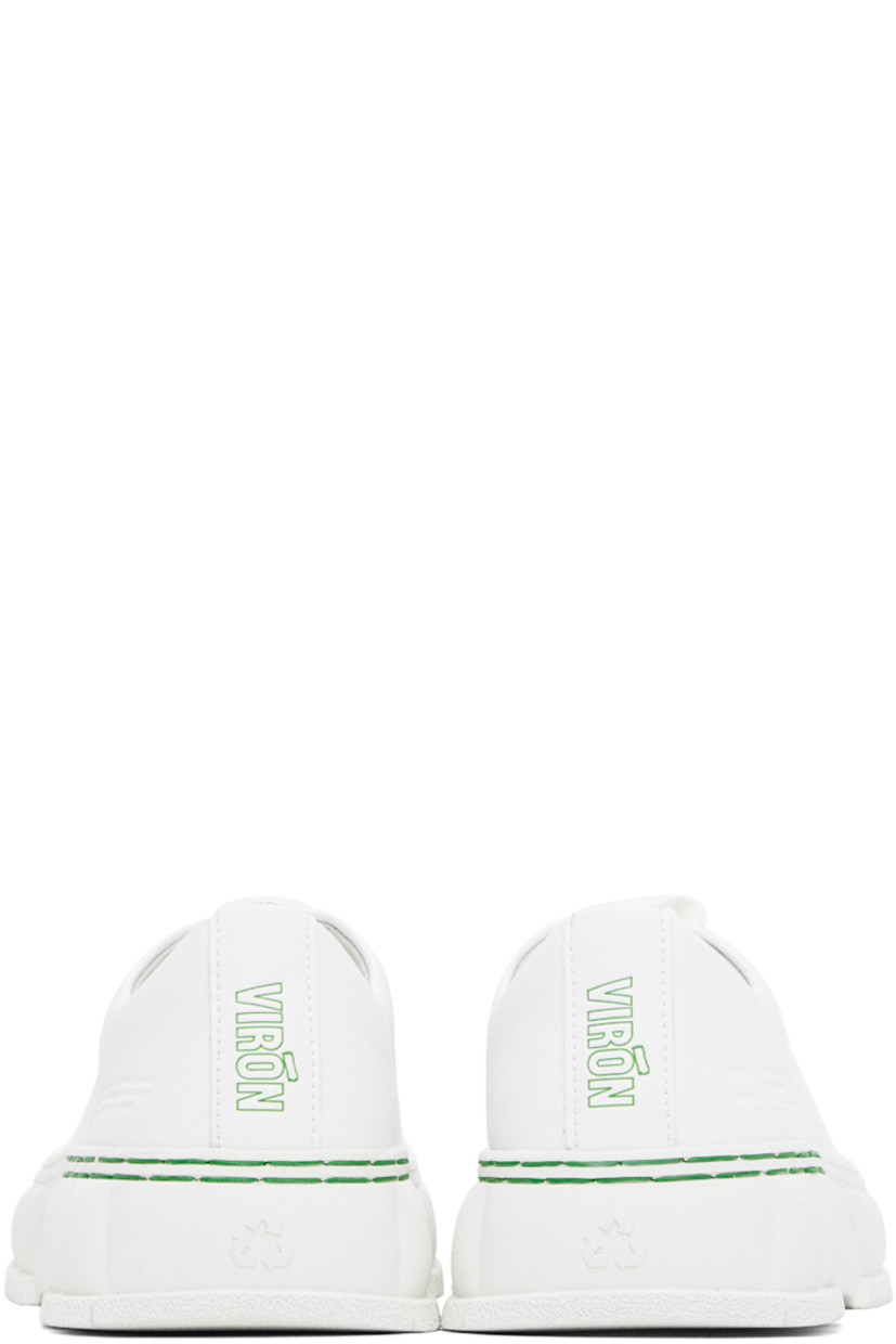 Handcrafted low-top buffed corn leather sneakers in white.

· Lace-up closure
· Logo embossed at tongue and heel
· Text embossed at outer side
· Grained faux-leather insole
· Faux-suede lining
· Treaded recycled rubber-blend sole
 
Supplier color: White