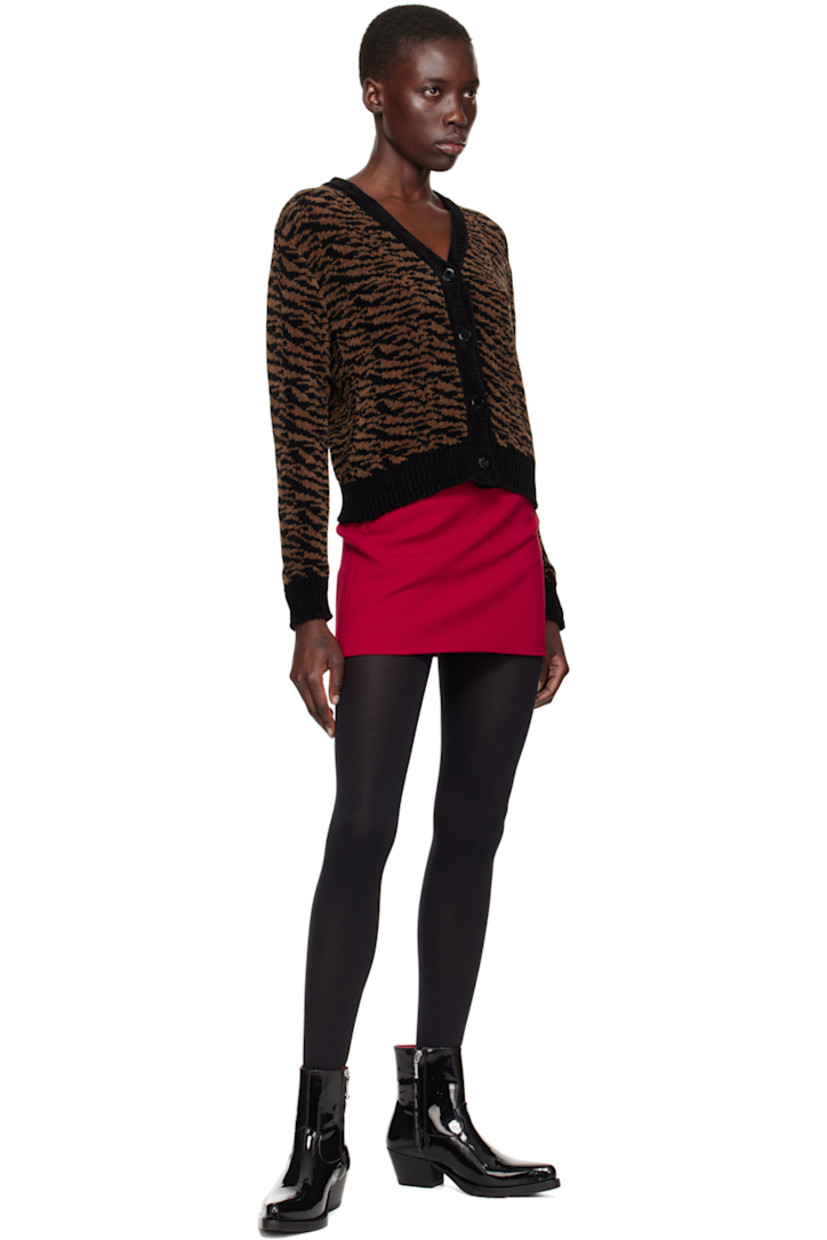 Knit stretch polyester- and viscose-blend skirt.

· Two-pocket styling
· Concealed zip closure at back waist
· Darts at back
· Full cotton twill lining

Supplier color: Red