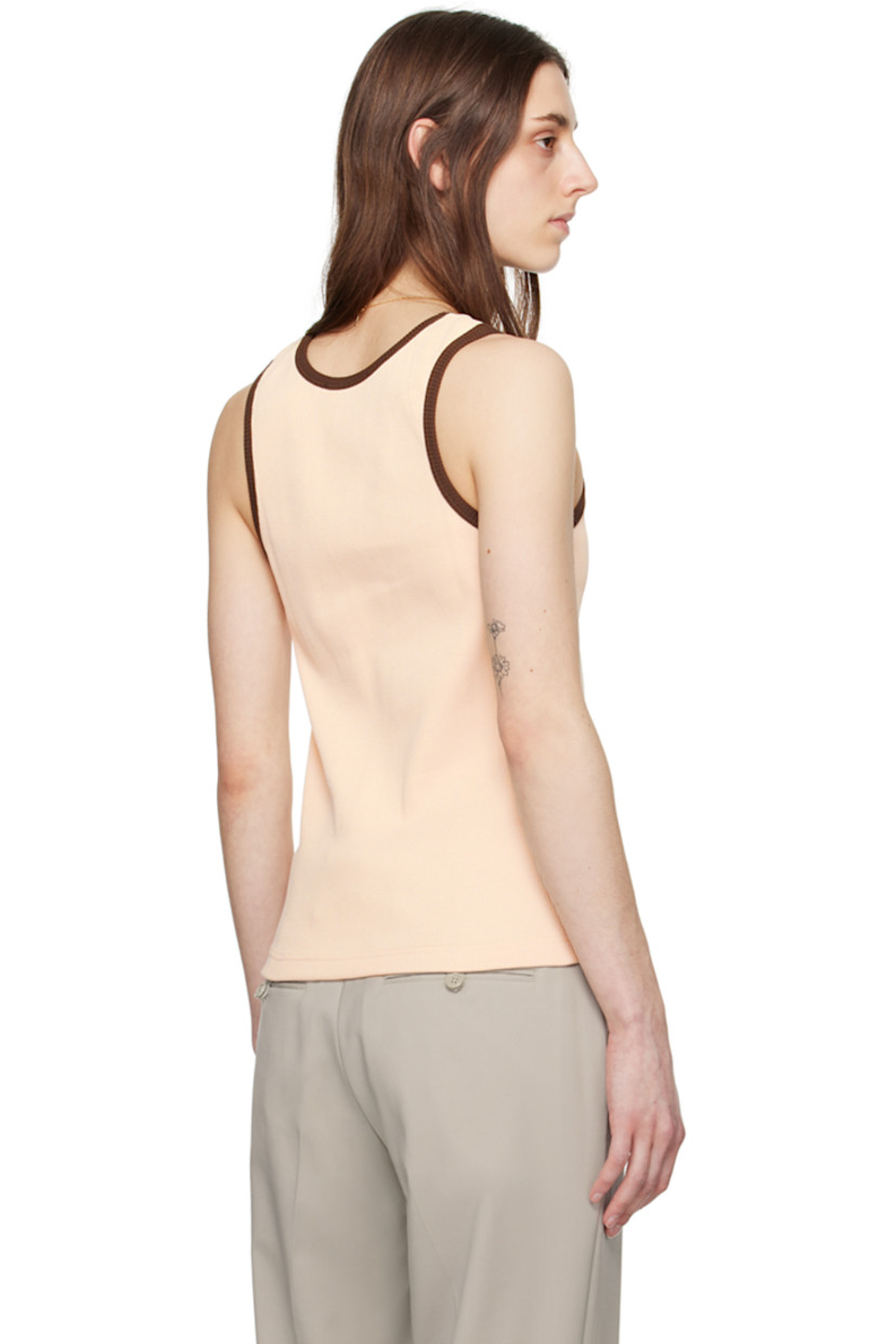 Rib knit organic cotton tank top.

· Scoop neck
· Logo embroidered at chest

Supplier color: Camel with brown
