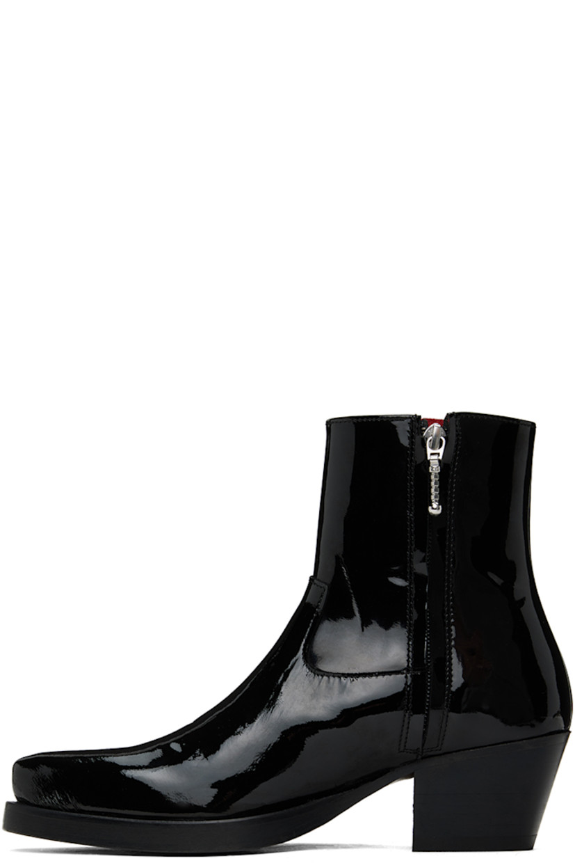 Ankle-high patent leather boots in black.

· Pointed toe
· Zip closure at inner side
· Grained leather lining
· Leather block heel with rubber injection
· Leather sole
· Heel: H2"

Supplier color: Black
