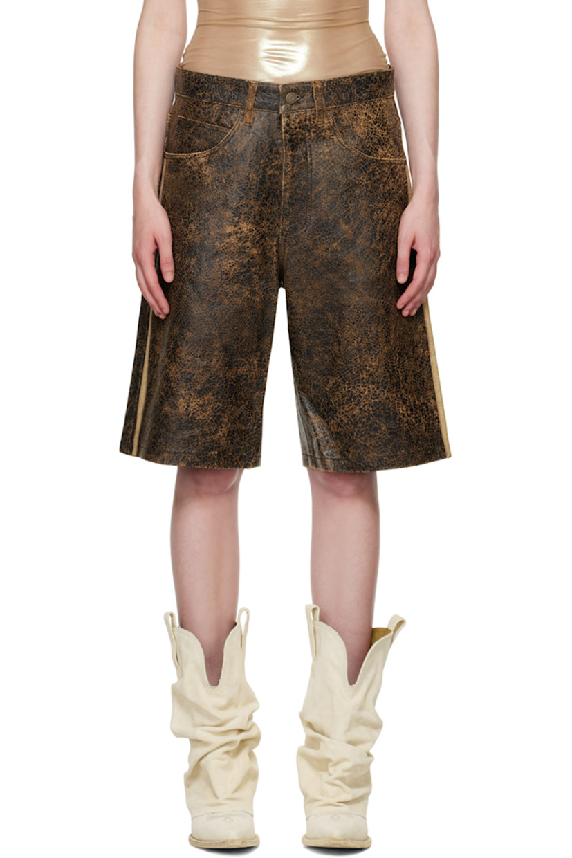 Relaxed-fit cracked lambskin shorts. Hand-distressing throughout.

· Low-rise
· Belt loops
· Five-pocket styling
· Zip-fly
· Stripe appliqué at outseams
· Logo patch at back pocket
· Unlined
· Logo-engraved antiqued copper-tone hardware

Supplier color: Amos brown