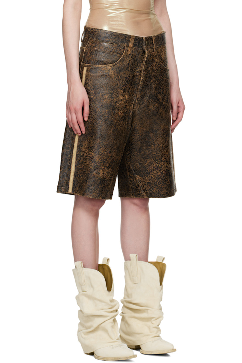 Relaxed-fit cracked lambskin shorts. Hand-distressing throughout.

· Low-rise
· Belt loops
· Five-pocket styling
· Zip-fly
· Stripe appliqué at outseams
· Logo patch at back pocket
· Unlined
· Logo-engraved antiqued copper-tone hardware

Supplier color: Amos brown