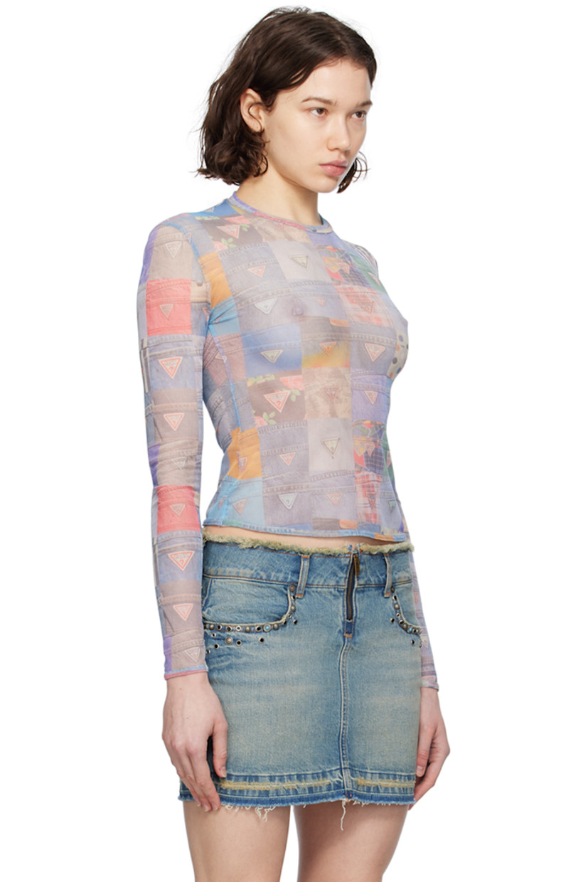 Semi-sheer stretch polyester mesh T-shirt. 

· Graphic logo pattern printed throughout
· Crewneck

Supplier color: Gusa patchwork print