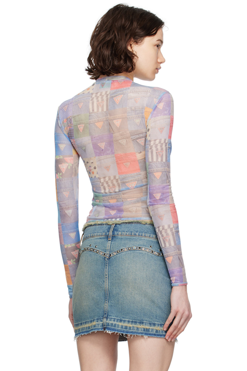 Semi-sheer stretch polyester mesh T-shirt. 

· Graphic logo pattern printed throughout
· Crewneck

Supplier color: Gusa patchwork print