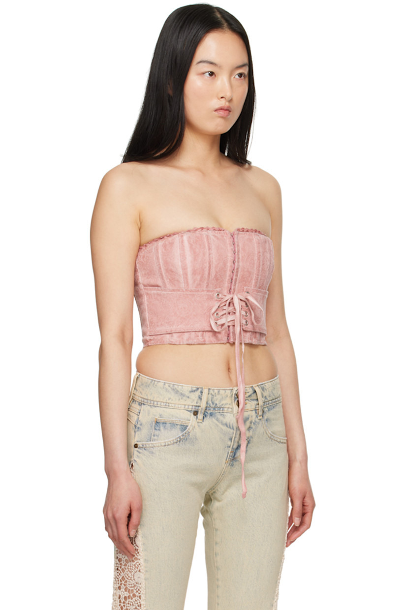 Stretch cotton damask corset. Hand-distressing, hand-fading, boning, and jacquard graphic pattern throughout.

· Broderie anglaise trim at straight neck
· Hook-eye fastening and lace-up detailing at front
· Zip closure at side
· Full viscose satin lining

Supplier color: Faded rose multi