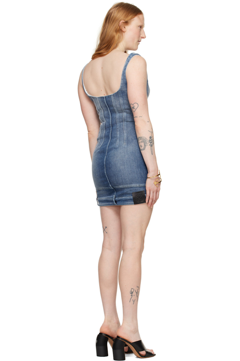 Stretch denim dress. Fading throughout.

· Paneled construction
· Sweetheart neck
· Darts at cups
· Boning at front and back
· Zip-fly at front hem
· Belt loops at hem
· Zip closure at side seam
· Fixed shoulder straps
· Partial twill lining
· Logo-engraved silver-tone hardware

Supplier color: Wash blue