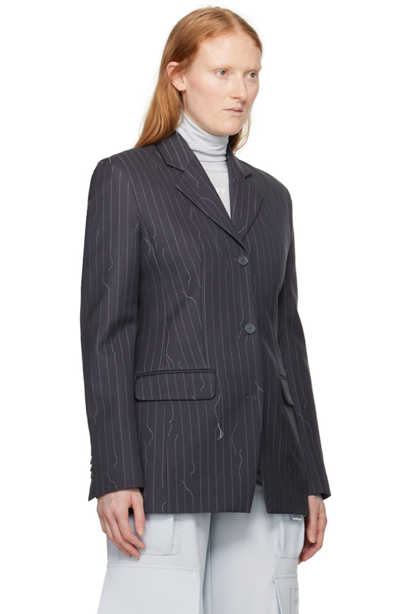 Virgin wool-blend twill blazer. Pinstripes throughout.

· Notched lapel
· Button closure
· Flap pockets
· Four-button surgeon's cuffs
· Central vent at back hem
· Partial logo-woven twill lining

Supplier color: Forged iron