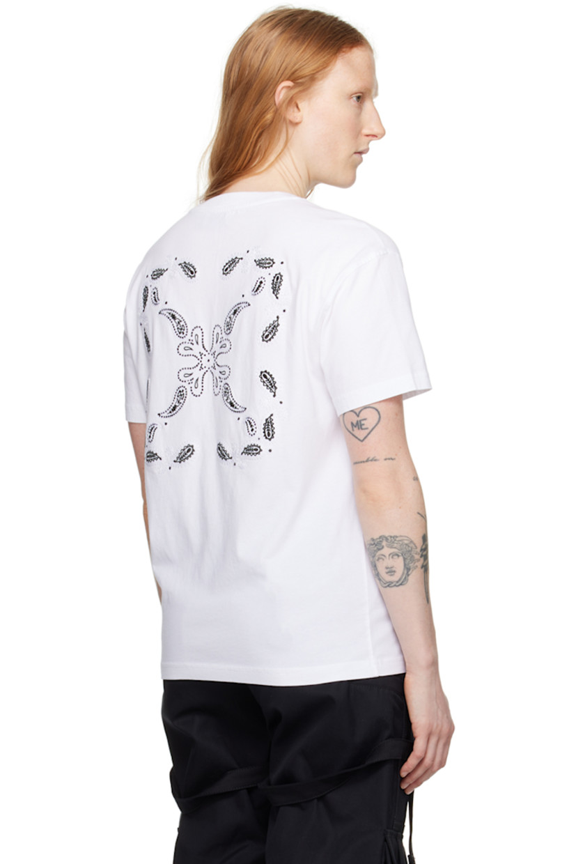 Cotton jersey T-shirt.

· Rib knit crewneck
· Logo printed at chest
· Graphic embroidered at front and back

Supplier color: White