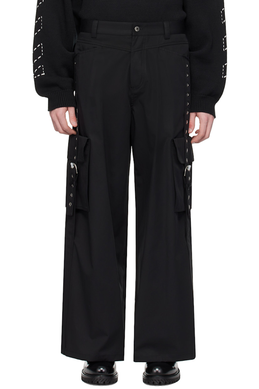 Cotton twill cargo pants. 

· Belt loops
�· Four-pocket styling
· Button-fly
· Cargo pockets 
· Pin-buckle strap and eyelets at outseams 
· Logo-engraved silver-tone hardware

Supplier color: Black