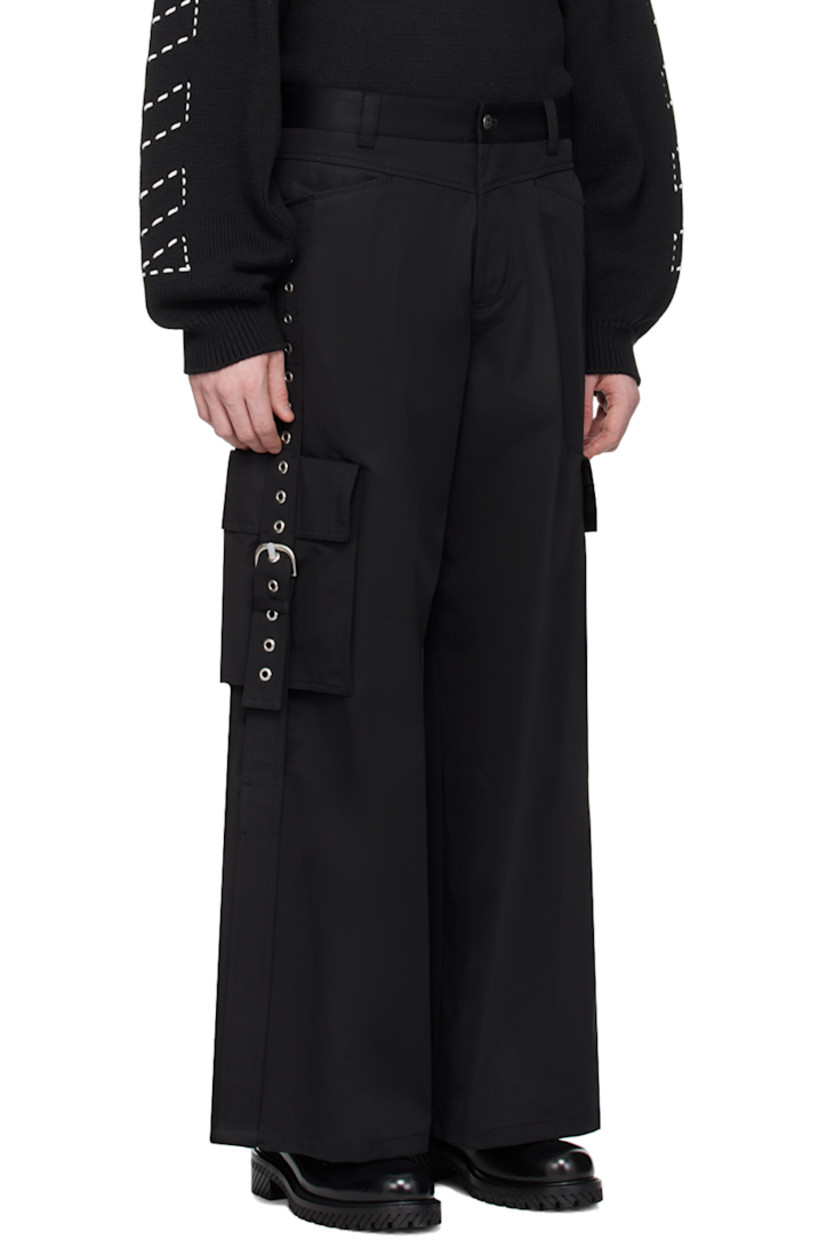 Cotton twill cargo pants. 

· Belt loops
· Four-pocket styling
· Button-fly
· Cargo pockets 
· Pin-buckle strap and eyelets at outseams 
· Logo-engraved silver-tone hardware

Supplier color: Black