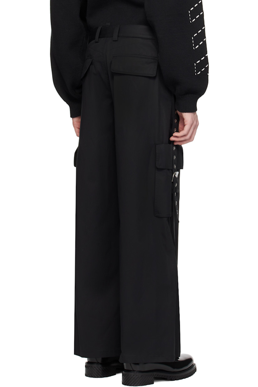 Cotton twill cargo pants. 

· Belt loops
· Four-pocket styling
· Button-fly
· Cargo pockets 
· Pin-buckle strap and eyelets at outseams 
· Logo-engraved silver-tone hardware

Supplier color: Black