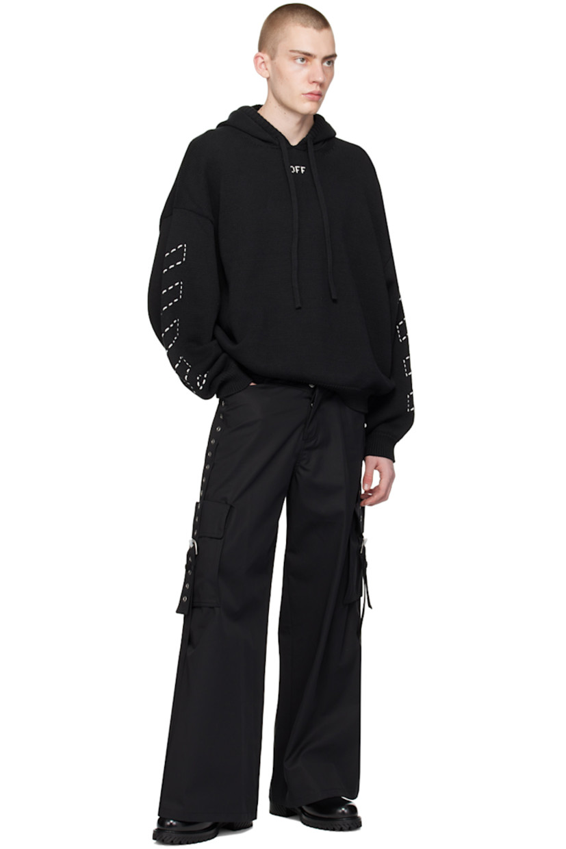Cotton twill cargo pants. 

· Belt loops
· Four-pocket styling
· Button-fly
· Cargo pockets 
· Pin-buckle strap and eyelets at outseams 
· Logo-engraved silver-tone hardware

Supplier color: Black