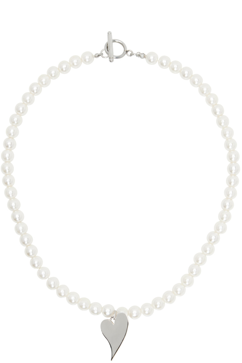 Beaded faux-pearl necklace in white.

· Graphic pendant at drop
· Toggle fastening
· L18"

Supplier color: White