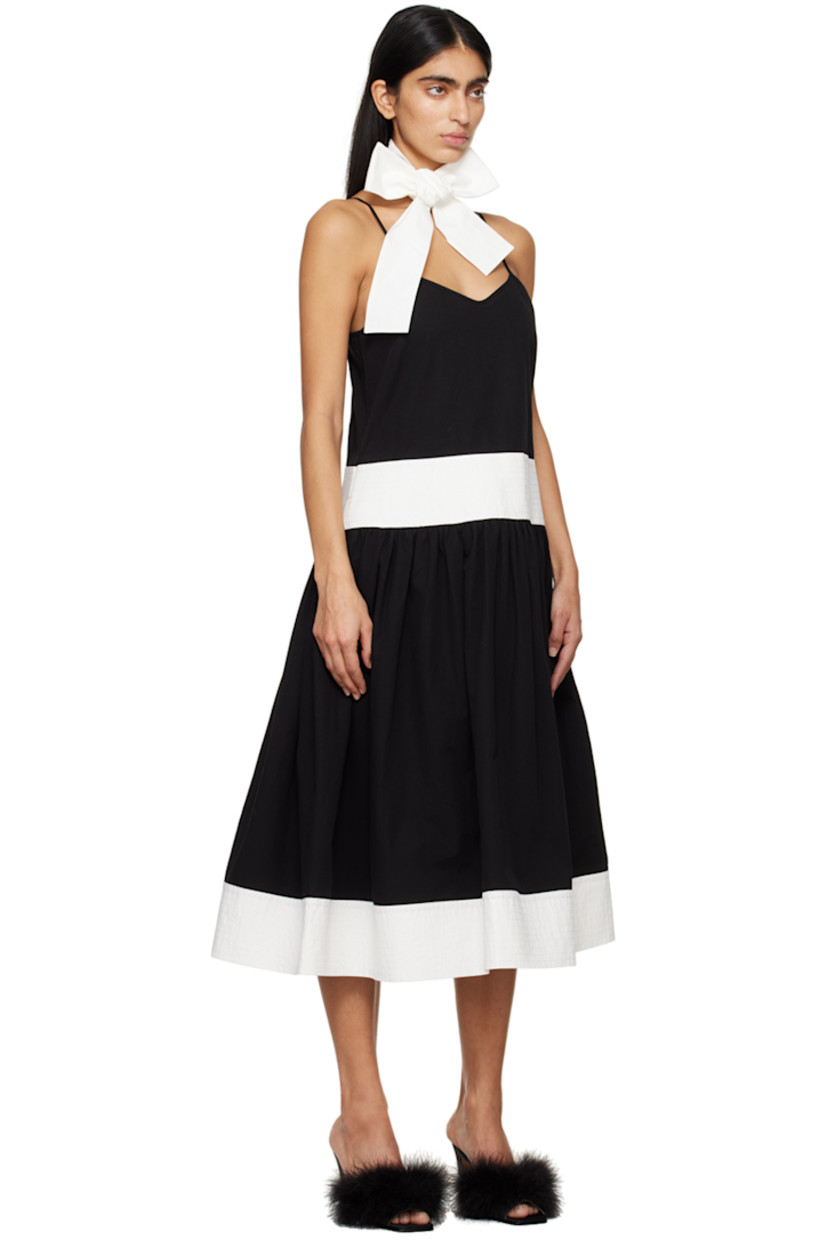 Cotton- and linen-blend broadcloth dress. Self-tie scarf included.

· Paneled construction
· Sweetheart neck
· Gathering at flared hem
· Seam pockets
· Adjustable shoulder straps
· Concealed zip closure at back

Supplier color: Black/White