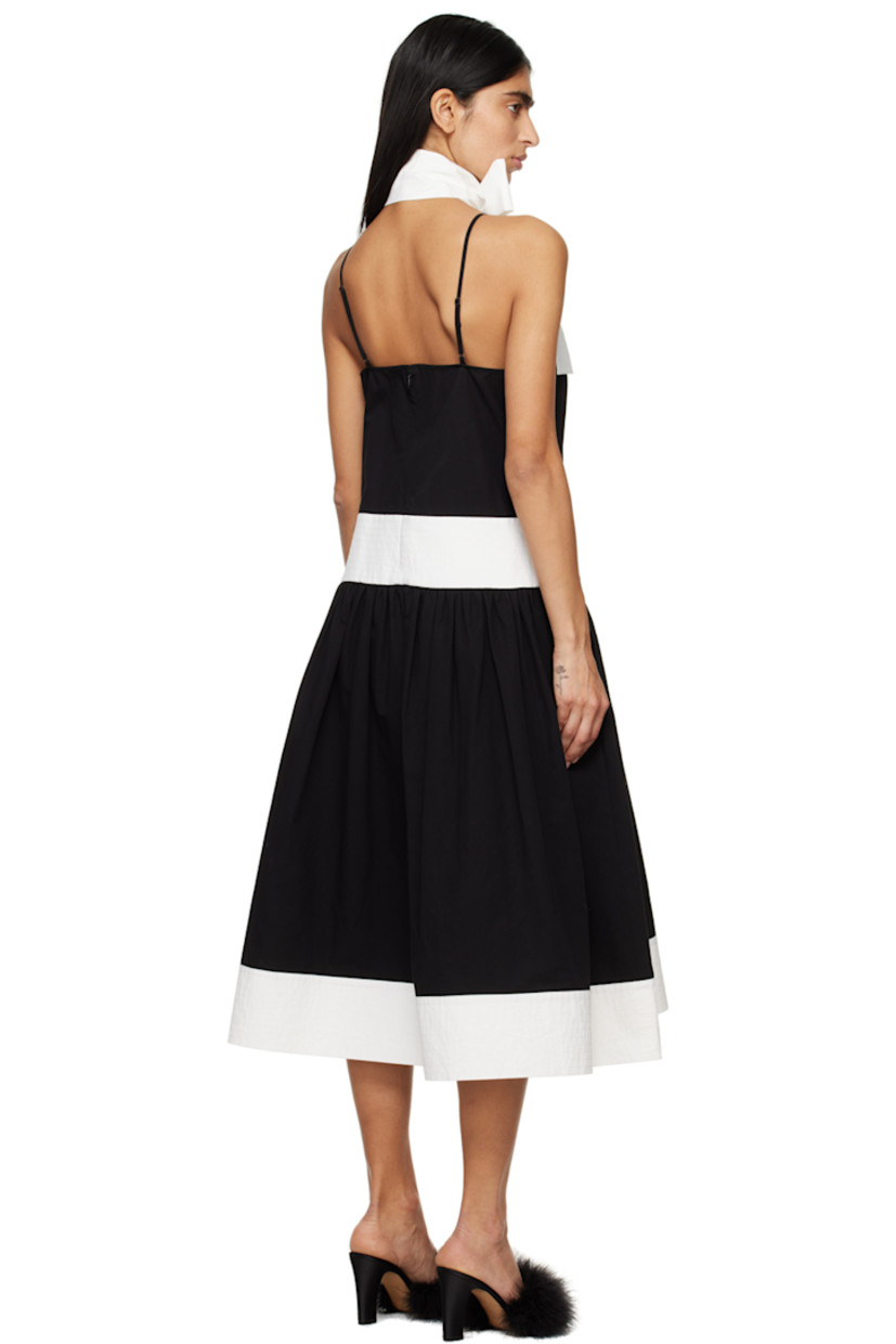 Cotton- and linen-blend broadcloth dress. Self-tie scarf included.

· Paneled construction
· Sweetheart neck
· Gathering at flared hem
· Seam pockets
· Adjustable shoulder straps
· Concealed zip closure at back

Supplier color: Black/White