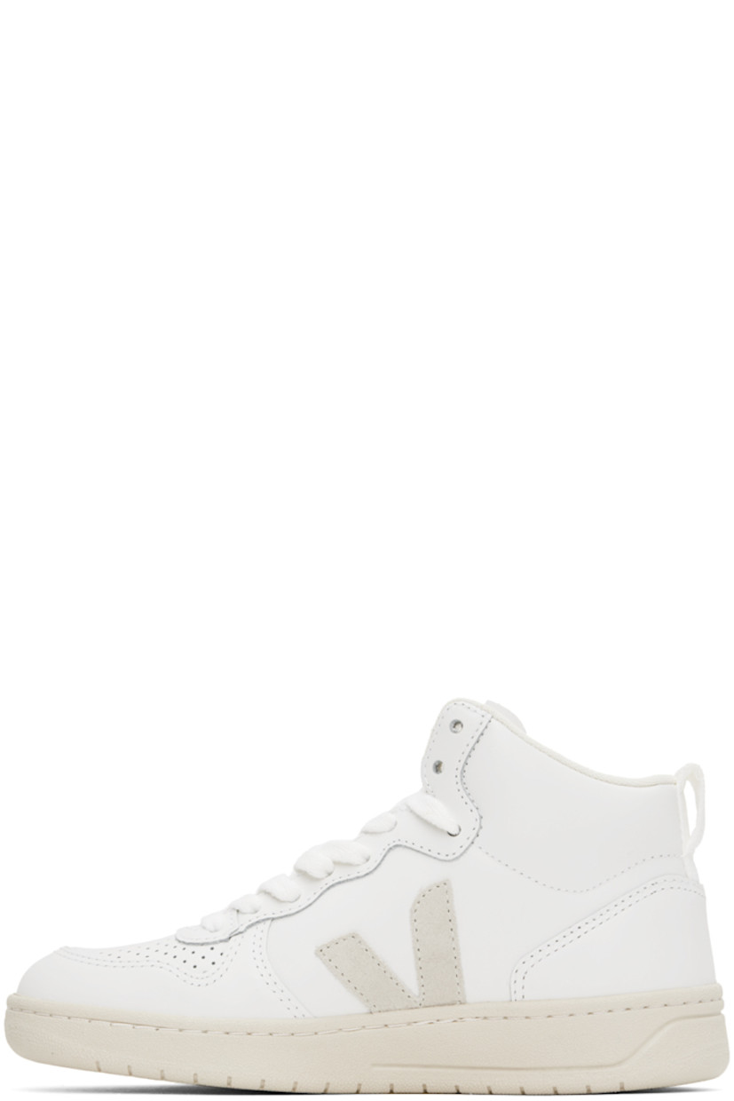 High-top buffed leather sneakers in white. 

· Perforated detailing at toe
· Lace-up closure
· Logo embossed at tongue
· Padded collar
· Webbing pull-loop at heel collar
· Suede logo appliqué at sides
· Mesh lining
· Treaded rubber sole

Supplier color: Extra white/Natural