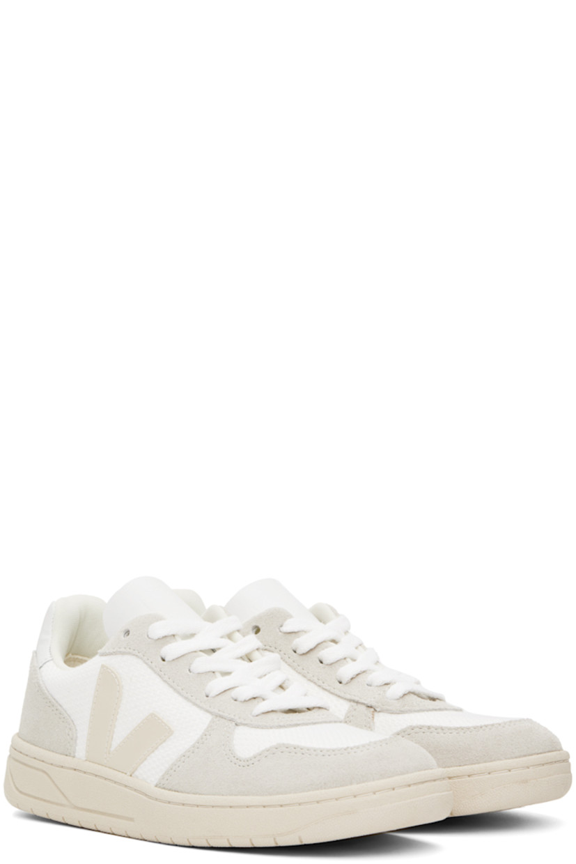 Low-top recycled plastic B-Mesh, suede, and leather sneakers in white.

· Lace-up closure
· Logo embossed at tongue
· Padded collar
· Rubber logo appliqué at sides
· Logo printed at heel tab
· Recycled polyester jersey lining
· Treaded rubber sole 

Supplier color: White natural/Pierre