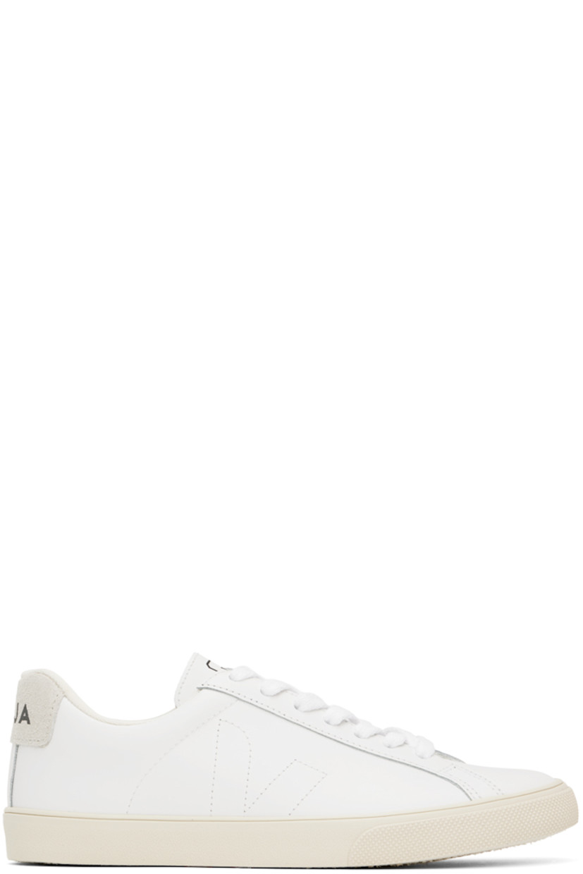 Low-top REACH-certified buffed leather sneakers in white.

· Lace-up closure
· Logo printed at tongue 
· Padded collar
· Logo topstitched at sides
· Logo printed at non-PFC-coated suede heel counter
· Mesh lining
· Treaded rubber sole

Supplier color: Extra white