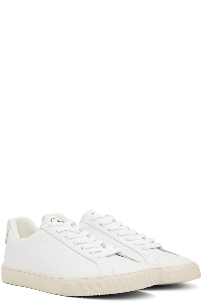 Low-top REACH-certified buffed leather sneakers in white.

· Lace-up closure
· Logo printed at tongue 
· Padded collar
· Logo topstitched at sides
· Logo printed at non-PFC-coated suede heel counter
· Mesh lining
· Treaded rubber sole

Supplier color: Extra white