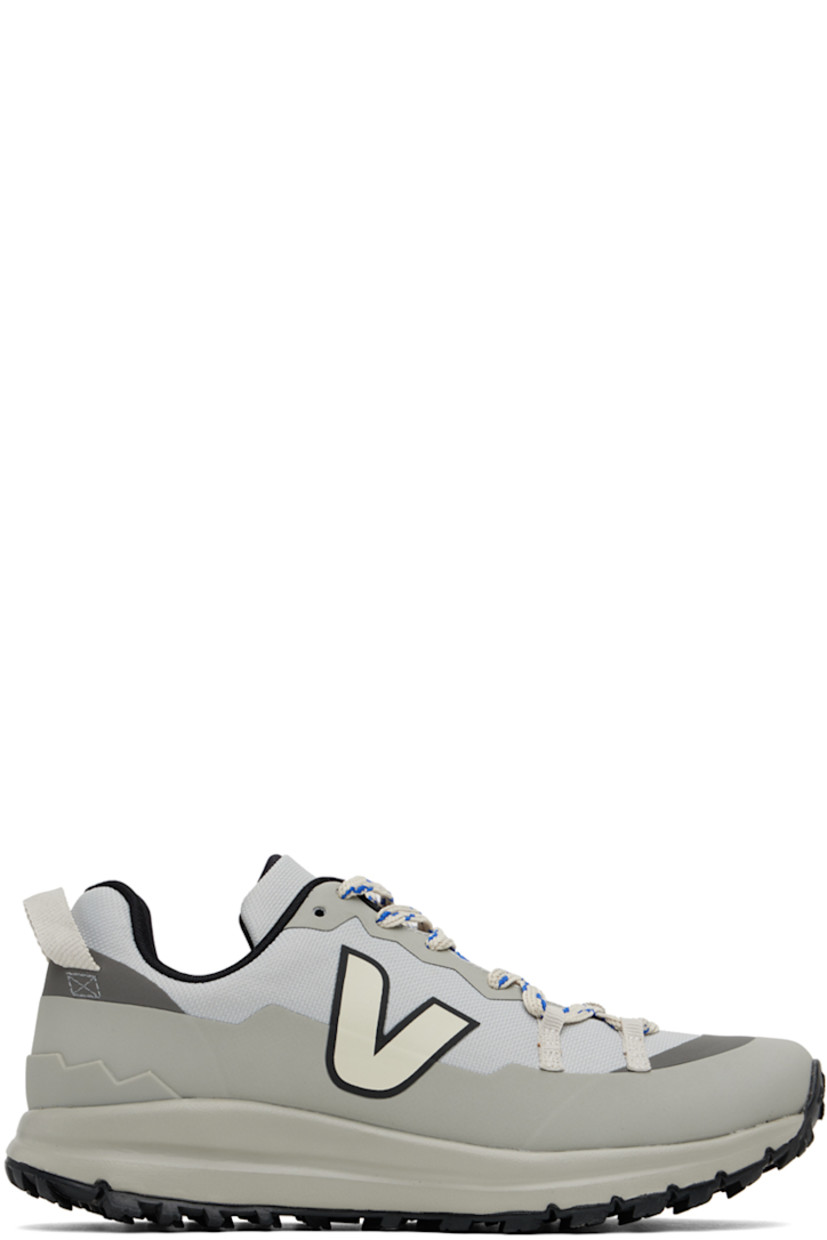 Low-top recycled polyester Trek-Shell sneakers in gray. PFC-free water-repellent coating.

· TPU trim throughout
· Lace-up closure
· Padded tongue and collar
· Logo appliqué at sides
· Pull-loop at heel tab
· Jersey lining
· EVA foam rubber midsole 
· Treaded rubber sole

Part of the Veja x Études collaboration.

Supplier color: Etudes/Shark