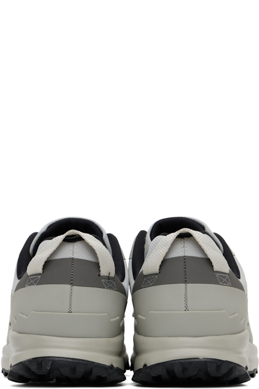 Low-top recycled polyester Trek-Shell sneakers in gray. PFC-free water-repellent coating.

· TPU trim throughout
· Lace-up closure
· Padded tongue and collar
· Logo appliqué at sides
· Pull-loop at heel tab
· Jersey lining
· EVA foam rubber midsole 
· Treaded rubber sole

Part of the Veja x Études collaboration.

Supplier color: Etudes/Shark