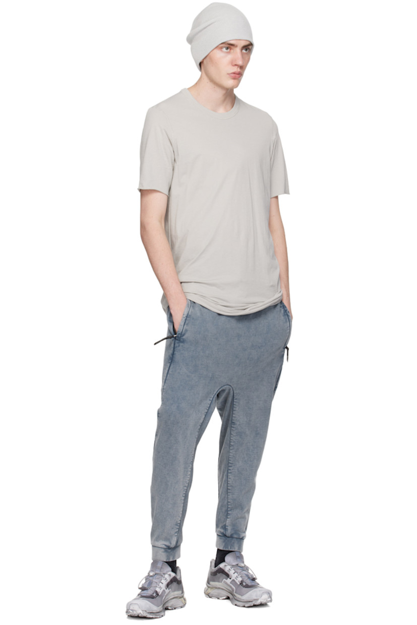 Garment-dyed cotton jersey T-shirt. 

· Rib knit crewneck
· Rolled edge at hem and cuffs
· Extended trim and offset seam at back

Supplier color: Light grey