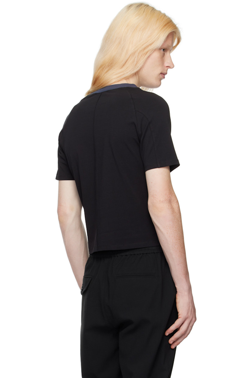 Polyester jersey T-shirt. Exposed seams throughout.

· Rib knit crewneck
· Logo embroidered at chest
· Cutout at front
· Raglan sleeves

Available exclusively at SSENSE.

Supplier color: Black