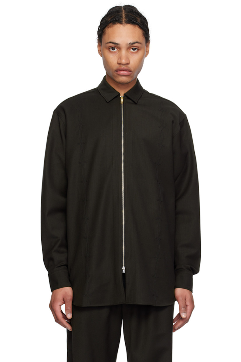 Stretch polyester- and wool-blend twill shirt.

· Spread collar
· Two-way zip closure
· Graphic pattern embroidered at front
· Modified shirttail hem
· Two-button barrel cuffs
· Box pleat at back yoke

Supplier color: Brown embroidered