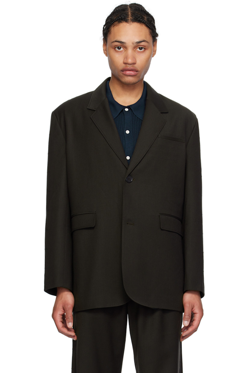 Plain-woven stretch polyester- and wool-blend blazer. Graphic pattern embroidered at sleeves and side seams.

· Notched lapel
· Button closure
· Welt and flap pockets
· Padded shoulders
· Welt pocket at interior
· Satin lining

Supplier color: Brown embroidered