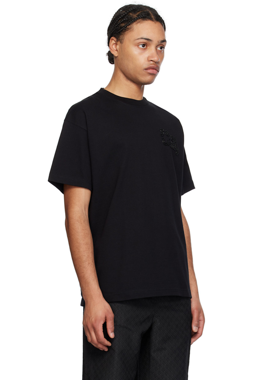 Heavyweight organic cotton jersey T-shirt.

· Rib knit crewneck
· Logo graphic beaded at chest
· Dropped shoulders

Supplier color: Black