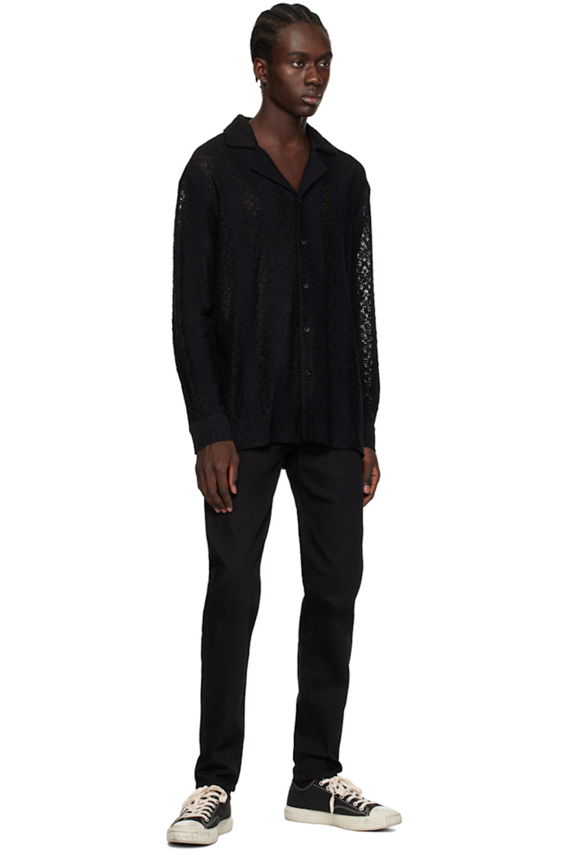Lightweight semi-sheer raschel knit stretch nylon shirt.

· Open spread collar
· Button closure
· Dropped shoulders
· Single-button barrel cuffs
· Inverted pleat at back yoke

Supplier color: Black