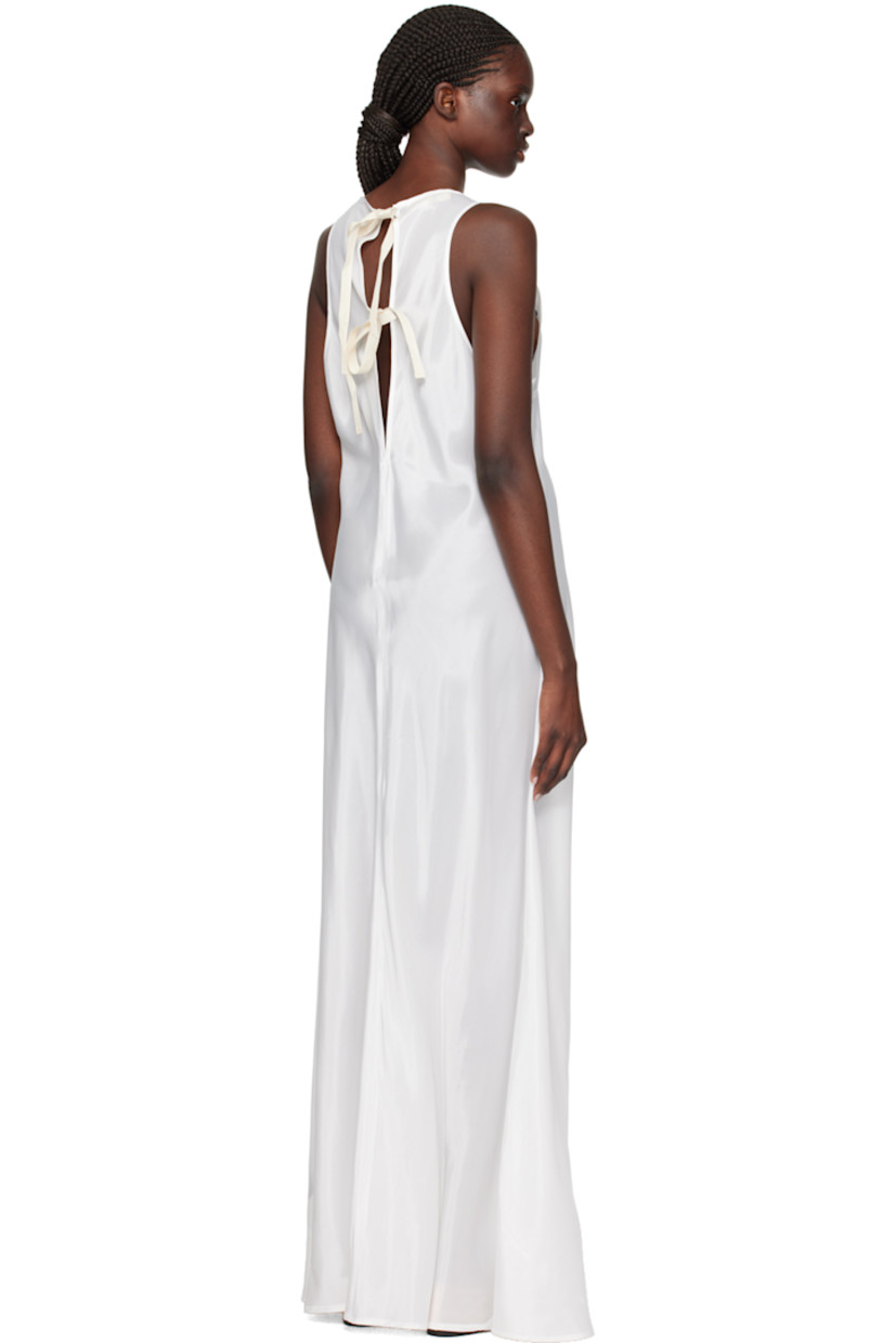 Acetate satin dress.

· Scoop neck
· Self-tie straps at open back
· Unlined

Supplier color: Antique white