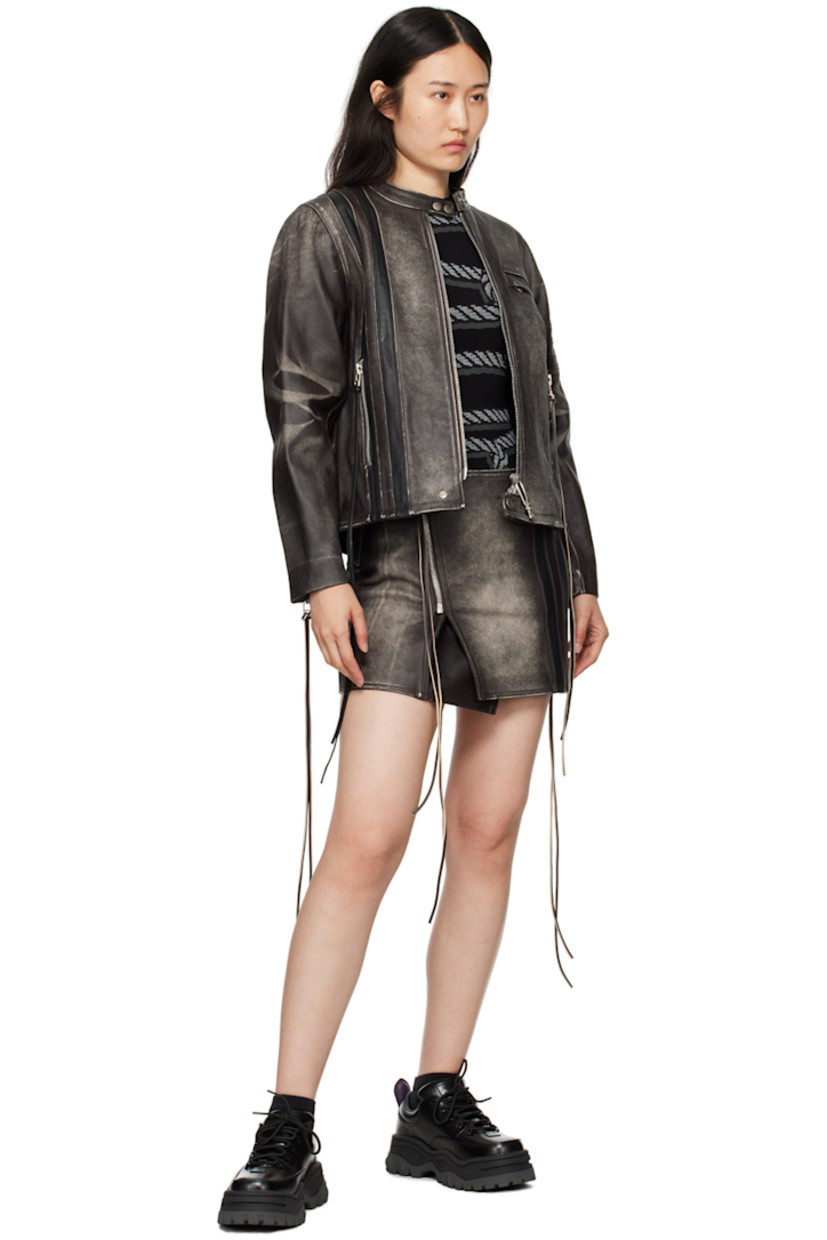 Grained leather jacket. Fading and whiskering throughout.

· Paneled construction
· Press-stud fastening at band collar
· Two-way zip closure
· Embossed logo and zip pocket at chest
· Stripes at front and sleeve
· Extended leather trim at zip pockets and cuffs
· Vented side seams
· Zip vent at cuffs
· Embossed logo at back hem
· Full twill lining

Available exclusively at SSENSE.

Supplier color: Brown stripe