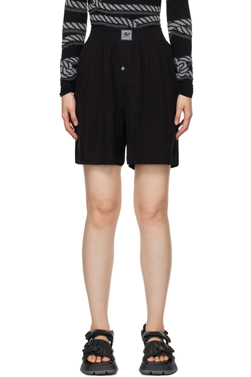 Cupro sateen shorts.

· Rubberized logo patch at elasticized waistband
· Three-pocket styling 
· Exposed single-button-fly

Supplier color: Black