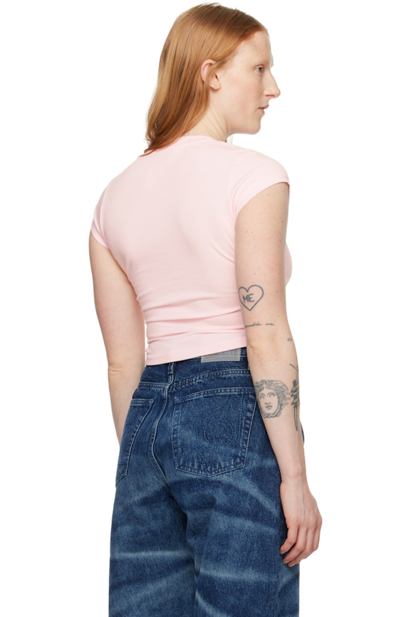 Stretch organic cotton jersey T-shirt. 

· Rib knit crewneck
· Text embroidered at front 
· Logo printed at front
· Cropped hem
· Logo flag at side seam

Supplier color: Eurotrash blush