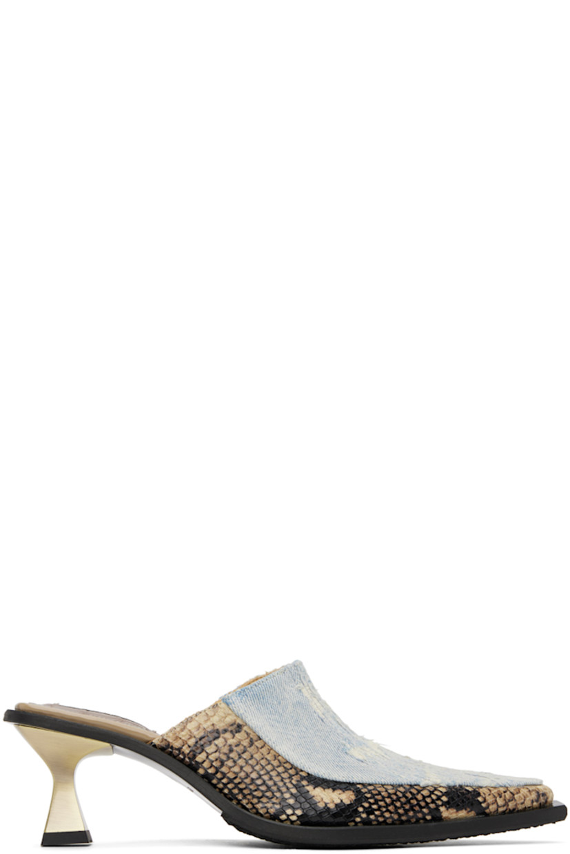 Paneled denim and croc-embossed leather slip-on heels in blue and brown.

· Pointed toe
· Distressing at vamp
· Logo patch at padded leather footbed
· Grained calfskin lining
· Metal kitten heel with rubber injection
· Tunit sole with rubber injection
· Heel: H2"

Supplier color: Denim slashed