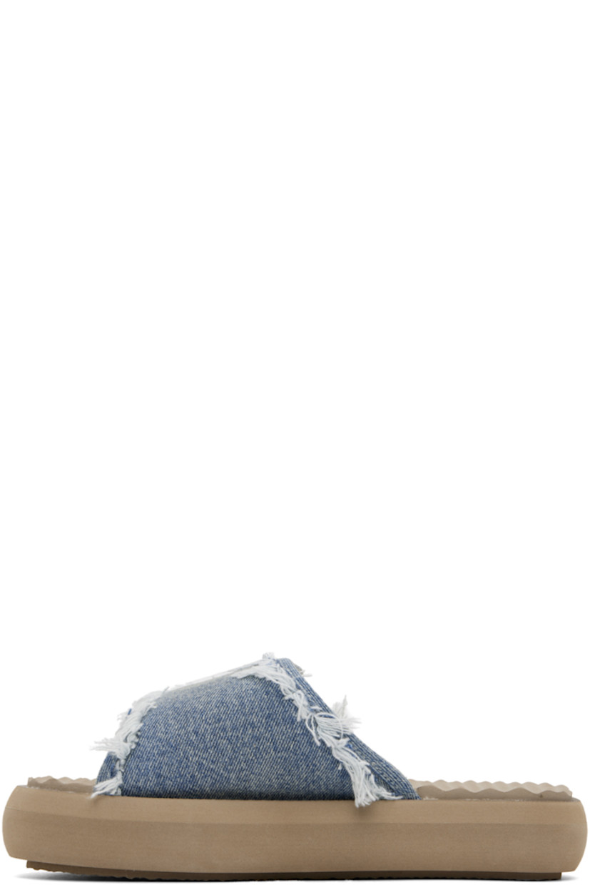Denim slip-on sandals in blue.

· Fading and frayed edges throughout
· Open square toe
· Velcro strap at vamp
· Logo hardware at vamp
· Rubberized logo patch at foam footbed
· Terrycloth lining
· Treaded EVA foam platform sole
· Platform: H1.5"

Supplier color: Denim light stone