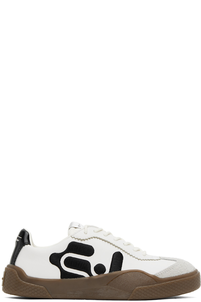 Low-top nappa leather sneakers in white. 

· Serrated edges throughout
· Suede cap toe
· Lace-up closure
· Logo patch at padded tongue
· Padded collar
· Logo embroidered at sides
· Eyelets at inner side
· Text embroidered at heel tab
· Logo embossed at heel
· Treaded rubber sole

Supplier color: Swan