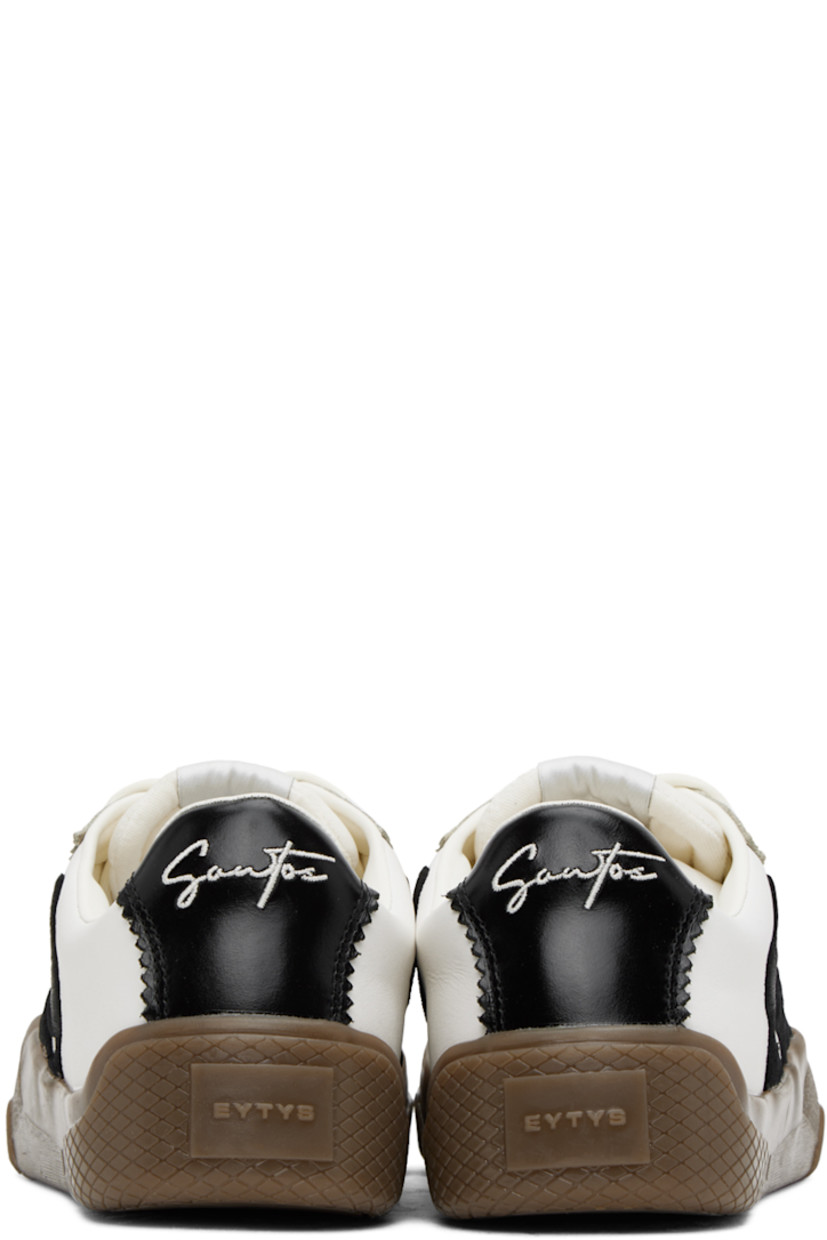 Low-top nappa leather sneakers in white. 

· Serrated edges throughout
· Suede cap toe
· Lace-up closure
· Logo patch at padded tongue
· Padded collar
· Logo embroidered at sides
· Eyelets at inner side
· Text embroidered at heel tab
· Logo embossed at heel
· Treaded rubber sole

Supplier color: Swan