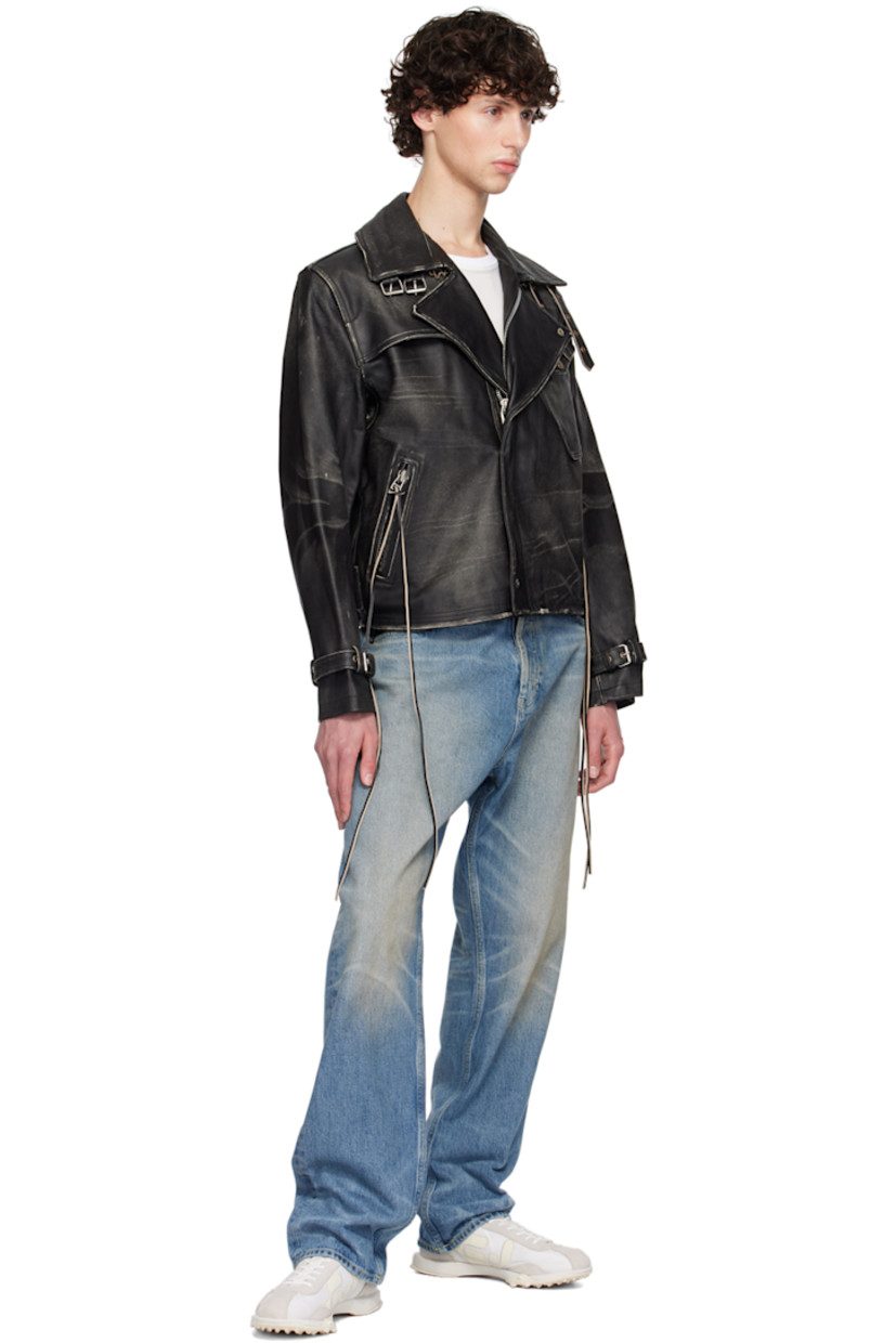 Grained leather jacket. Fading, subtle distressing, and whiskering throughout.

· Adjustable pin-buckle fastenings at notched lapel
· Offset zip closure with press-stud placket
· Storm flap at chest
· Logo embossed at flap pocket
· Extended trim at zip pockets
· Eyelets at armscyes
· Pin-buckle strap at cuffs and back hem
· Welt pocket at interior
· Full satin lining
· Logo-engraved silver-tone hardware

Supplier color: Black
