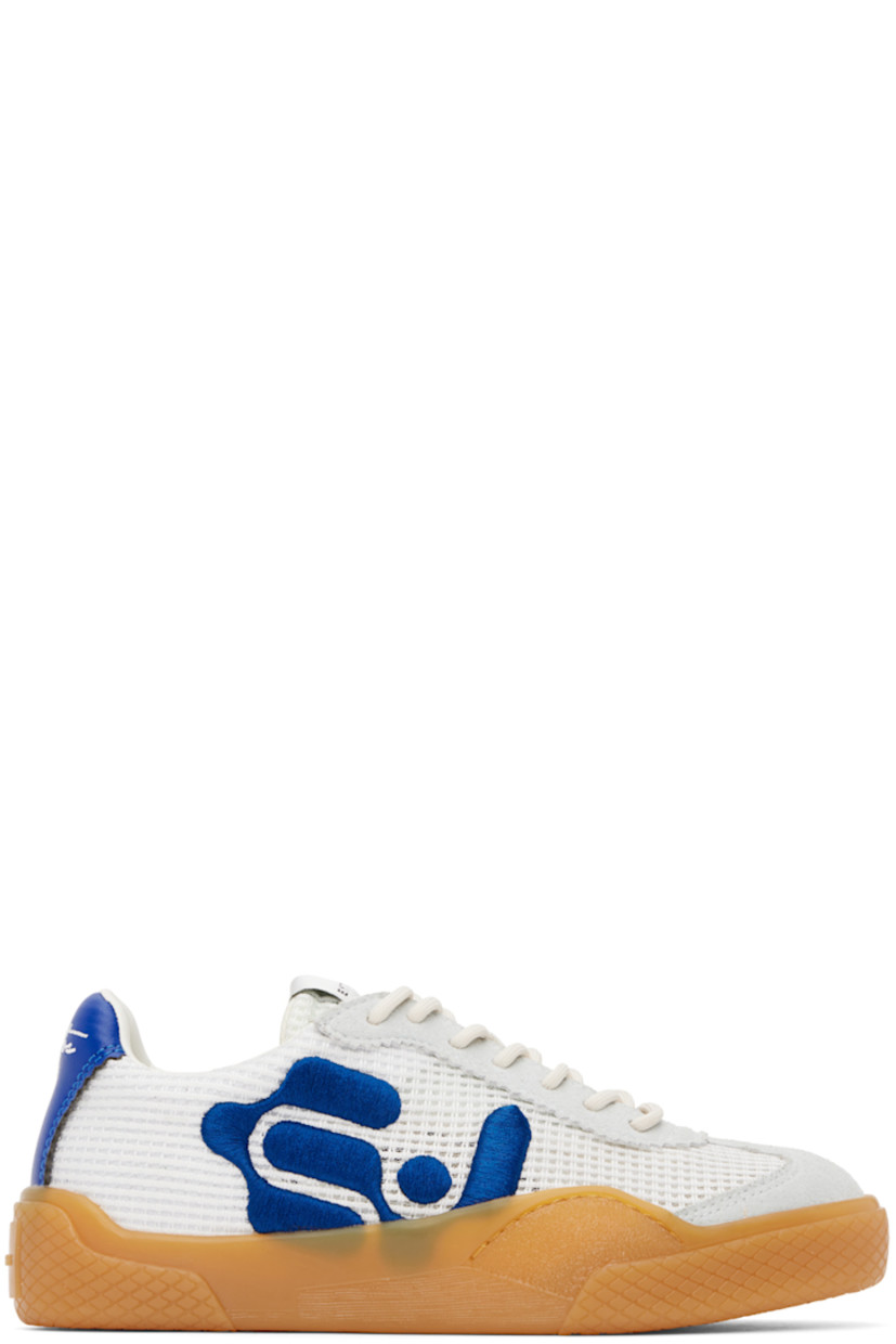 Low-top mesh sneakers in gray and blue.

· Serrated edges and suede trim throughout
· Suede cap toe
· Lace-up closure
· Logo patch at padded tongue
· Padded collar
· Logo embroidered at sides
· Eyelets at inner side
· Text embroidered at heel tab
· Logo embossed at heel
· Unlined
· Treaded rubber sole

Supplier color: Mesh blue bird
