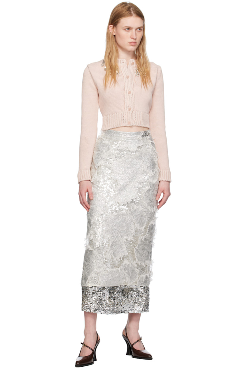 Sequinned nylon tulle and viscose mesh skirt. Frayed edges and fishnet detailing throughout.

· Layered construction
· Concealed zip closure at back
· Central vent at back hem
· Full acetate- and silk-blend georgette lining

Supplier color: Silver