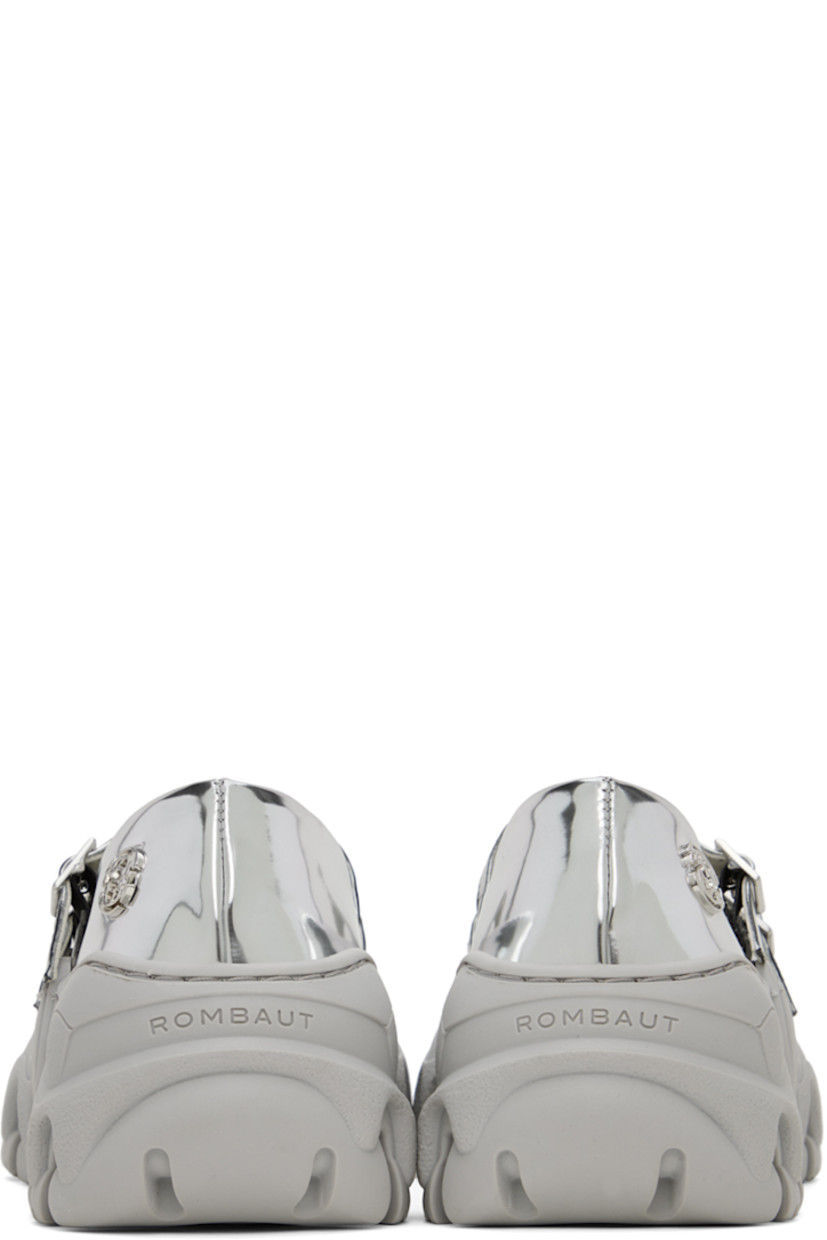 Handcrafted patent faux-leather ballerina flats in metallic silver tone.

· Pointed toe
· Pin-buckle straps at vamp
· Logo hardware at outer side
· Logo embossed at heel counter
· Sculptural TPU platform midsole
· Treaded TPU sole
· Platform: H1.5"

Available exclusively at SSENSE. 

Supplier color: Silver