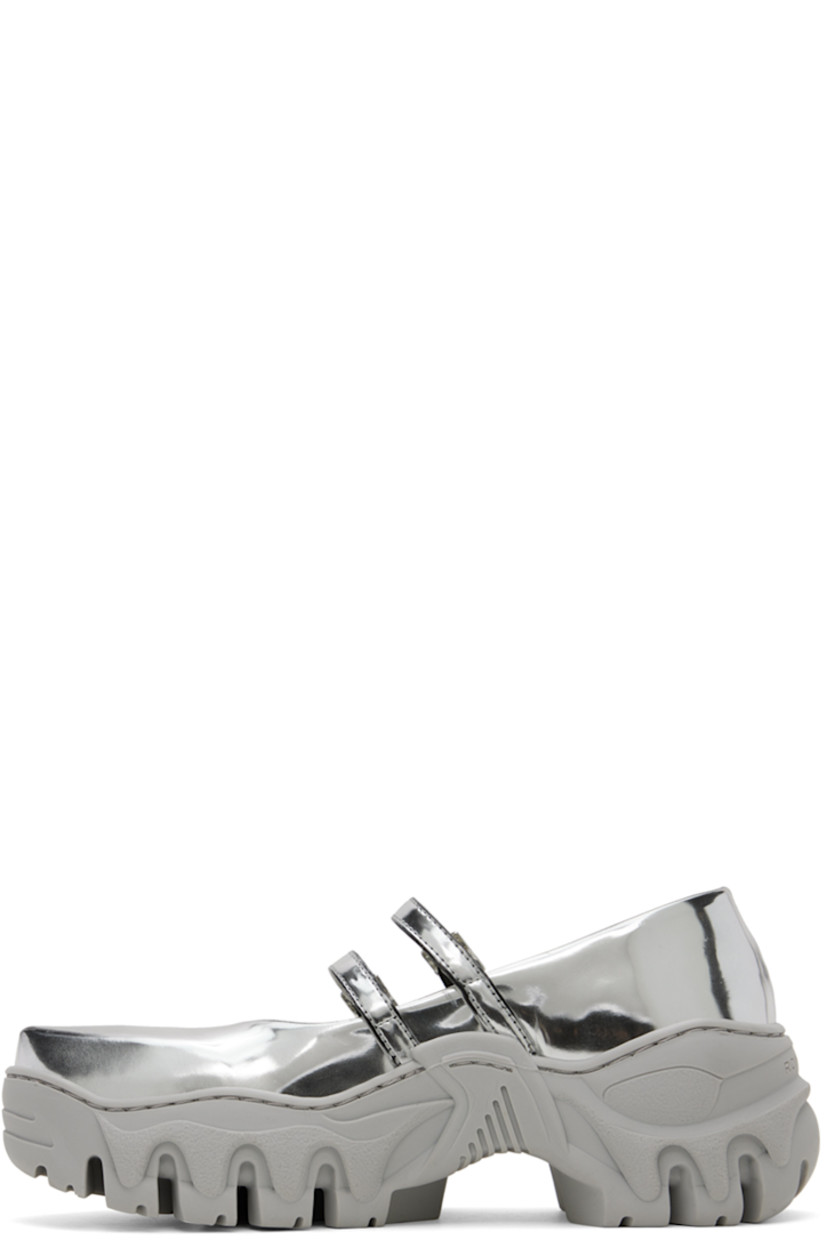 Handcrafted patent faux-leather ballerina flats in metallic silver tone.

· Pointed toe
· Pin-buckle straps at vamp
· Logo hardware at outer side
· Logo embossed at heel counter
· Sculptural TPU platform midsole
· Treaded TPU sole
· Platform: H1.5"

Available exclusively at SSENSE. 

Supplier color: Silver