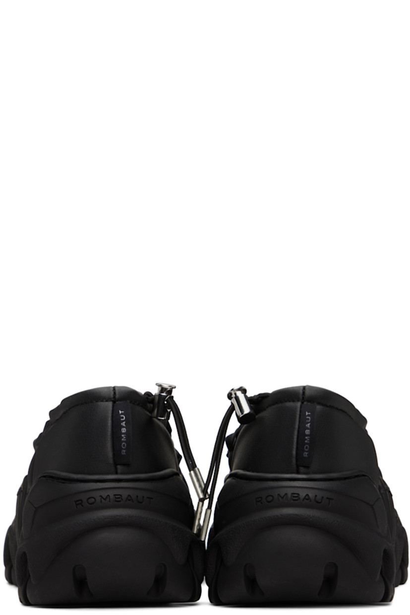 Handcrafted grained faux-leather ballerina flats in black.

· Bungee-style drawstring at elasticized collar 
· Logo flag at heel tab
· Logo embossed at heel counter 
· Mesh lining
· Treaded sculptural TPU platform sole
· Platform: H2"

Supplier color: Black beyond leather