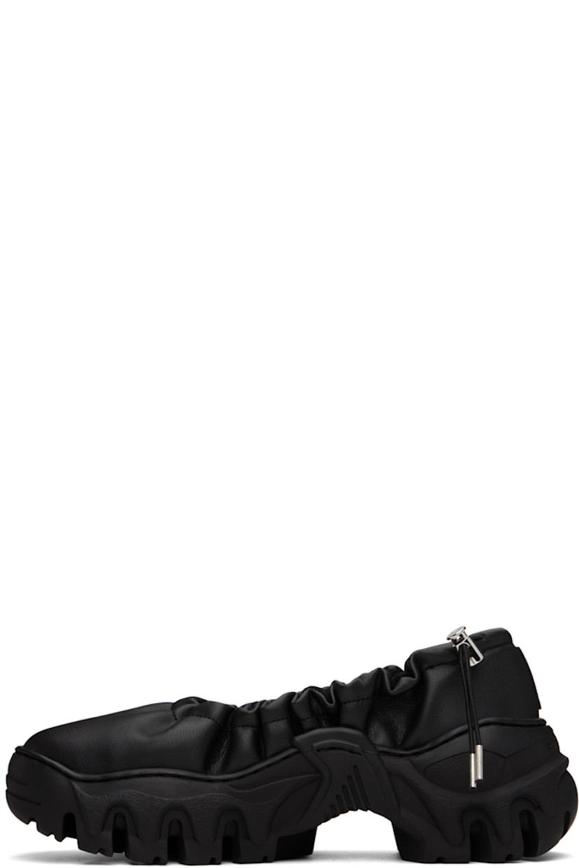 Handcrafted grained faux-leather ballerina flats in black.

· Bungee-style drawstring at elasticized collar 
· Logo flag at heel tab
· Logo embossed at heel counter 
· Mesh lining
· Treaded sculptural TPU platform sole
· Platform: H2"

Supplier color: Black beyond leather