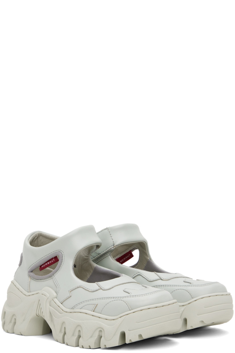 Handcrafted low-top paneled buffed faux-leather sneakers in gray.

· Velcro ankle strap
· Cutout at heel and outer side
· Mesh lining
· Treaded sculptural TPU platform sole
· Platform: H2"

Supplier color: Light grey