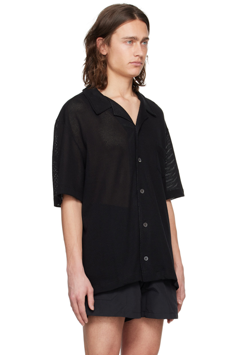 OEKO-TEX® Standard 100-certified cotton mesh shirt. Lightweight and breathable. 

· Open spread collar
· Button closure
· Patch pocket at chest
· Vented side seams 

Supplier color: Black